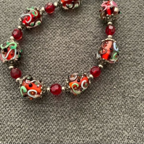 2/$15 Red painted glass bead bracelet adjustable - Picture 2 of 3